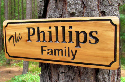 Carved Wood Sign Personalized with a Family Name