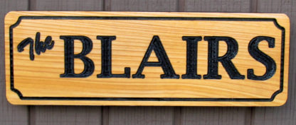 Carved Wood Sign Personalized with a Family Name