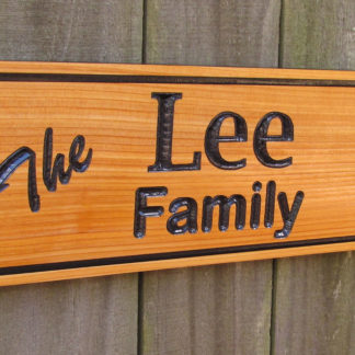 Carved Wood Sign Personalized with a Family Name